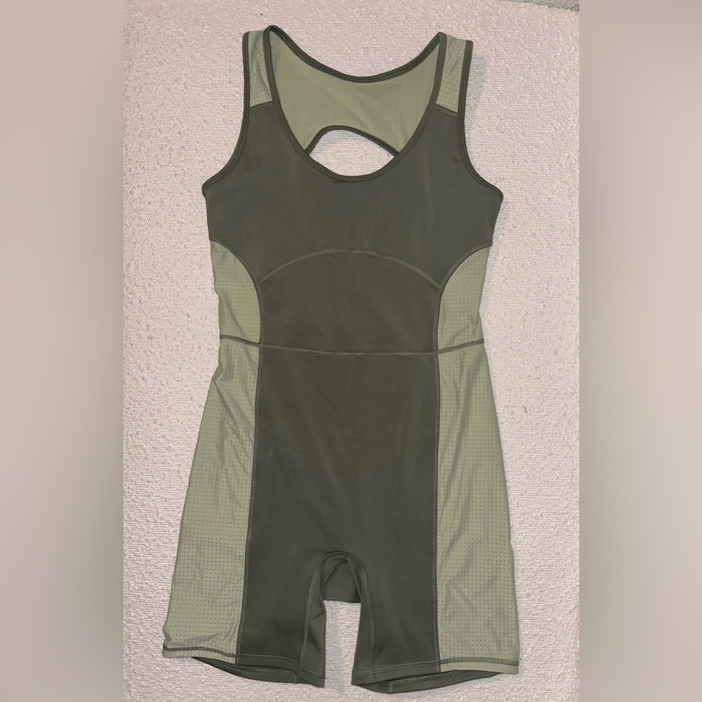 Fabletics the khloe edition motion 365 open back onesie.